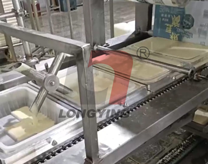 龍應(yīng)豆腐全自動灌裝封口機(jī)