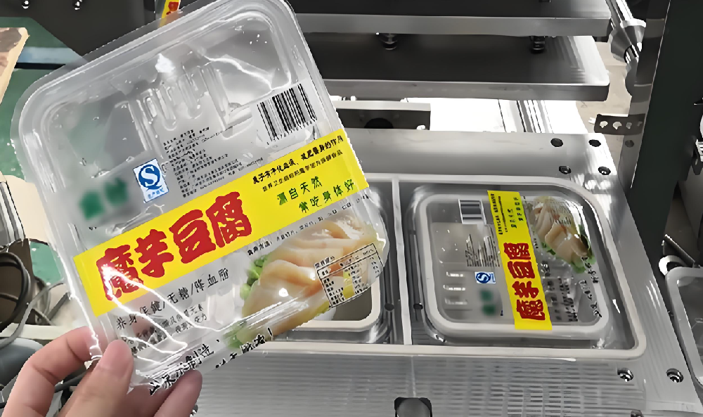 龍應(yīng)魔芋豆腐全自動(dòng)封口機(jī)